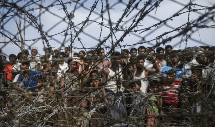 rohingya people with iron gate